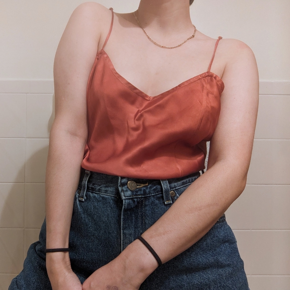 Orange Victoria's Secret silk cami with slit and knot button